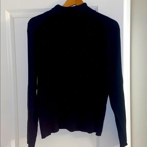 Black turtle neck sweater